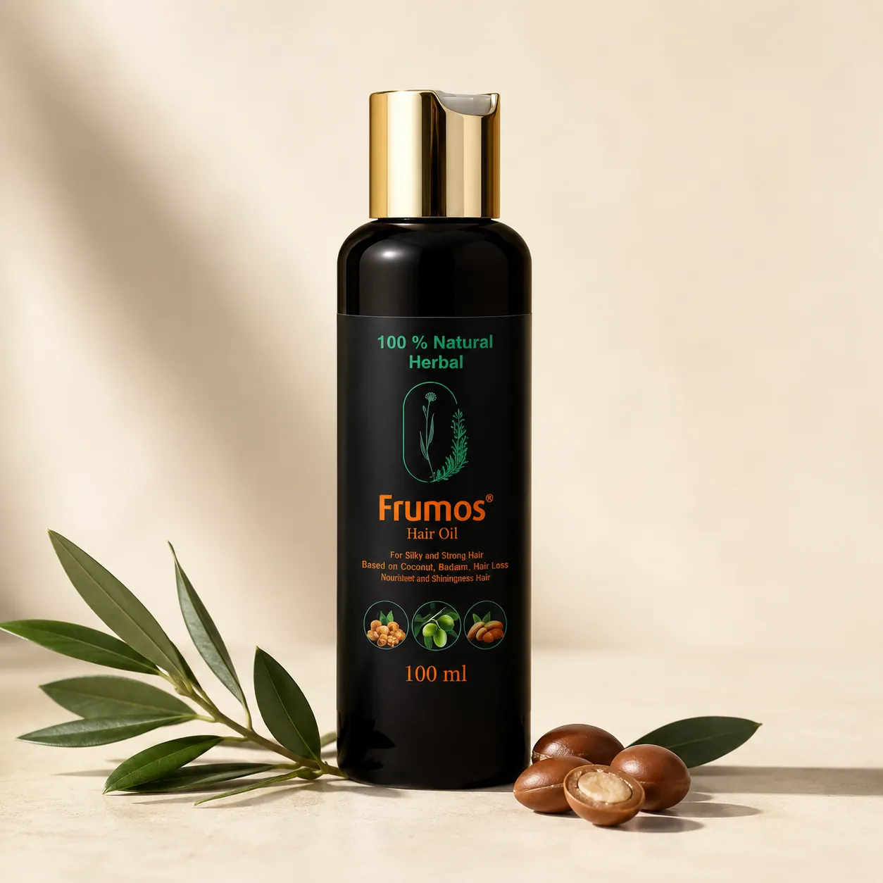 Frumos Natural Hair Oil bottle with a fresh green leaf and argan nuts